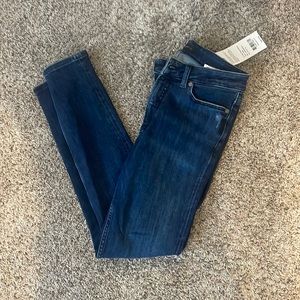 Silver, blue skinny jeans, size 27
